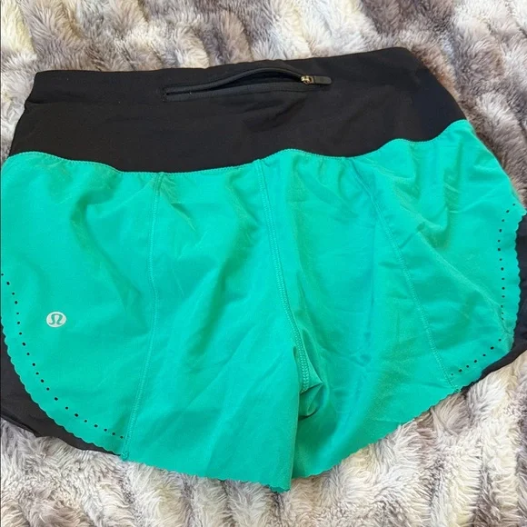 Lululemon Athletica Black and Teal Athletic Shorts - Picture 2 of 3